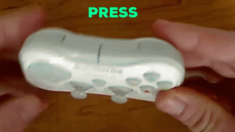 Animation of holding the reset button on a Bluetooth controller