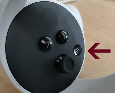 Menu button on the left-hand Quest controller, marked with an arrow